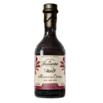 Rhum La Favorite Réserve du Château 2025 en bouteille sombre, étiquette beige avec palmier et texte « la Favorite », finition dorée.
