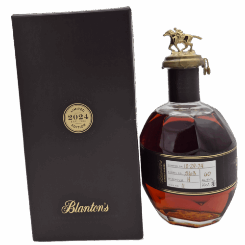 Bouteille de bourbon Blanton’s Single Barrel 70 cl avec bouchon à cheval, présentée près d’un étui noir édition limitée 2024.