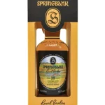 Whisky Springbank 10 ans Local barley en flacon dans sa boîte jaune et noire, étiquette colorée affichant “Local Barley” et “Aged 10 years”.